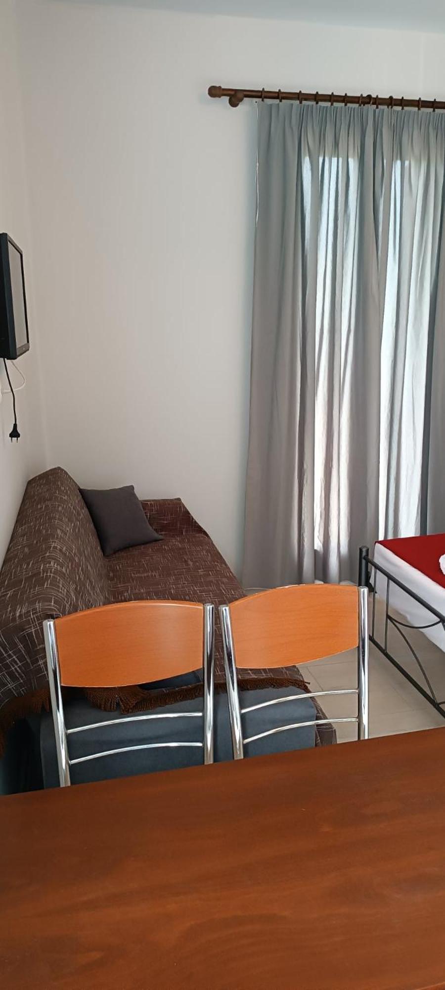 Andros Guesthouses Pokoj fotografie